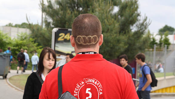 A Le Mans crazy fan with the four Audi rings as his hairstyle