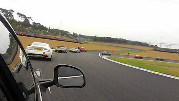 View from the Rapide as  the fleet of Astons head out on to the Le Mans circuit
