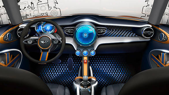 The Vision concept moves the speedo to the driver's side but maintains the large, center-mounted display. 