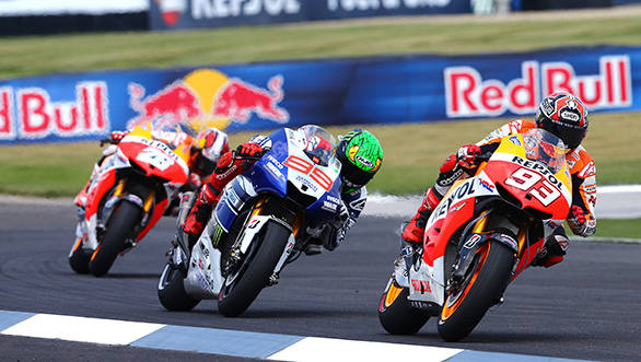 Marquez blitzed past Pedrosa (left) and Lorenzo (centre) to win at Indianapolis