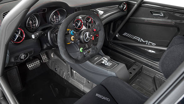 The racing steering wheel comes with shift paddles for gearshifts