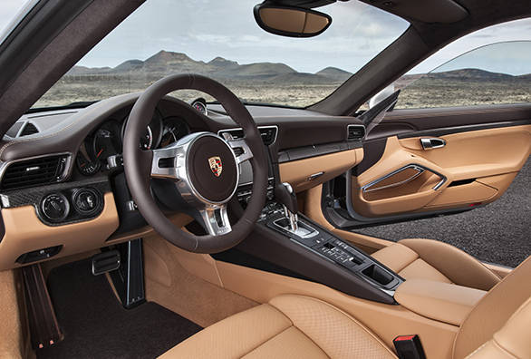 Luxurious but focused interiors-note the absence of steering mounted audio controls and subtle carbon fibre trim