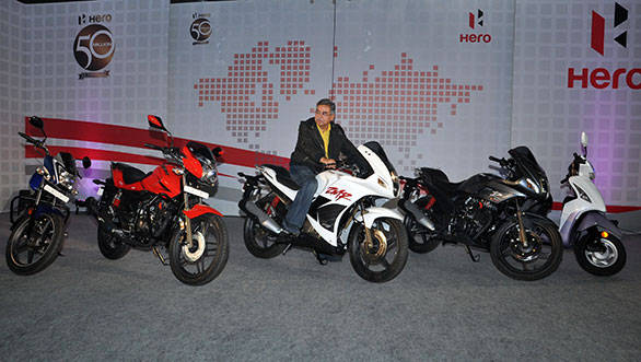 Pawan Munjal with the repertoire of new Hero bikes