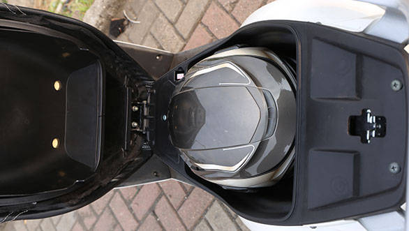 The 17 litre under seat storage was large enough to take a half face helmet