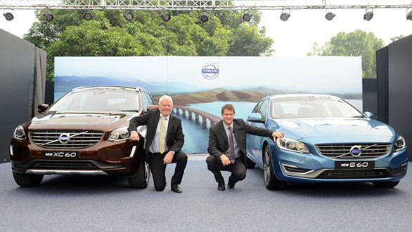 Harald Sandberg, the ambassor of Sweden and Tomas Ernberg MD of Volvo India with the new XC60 and S60