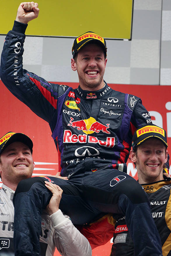 Nico, Sebastian and Romain celebrate on the podium