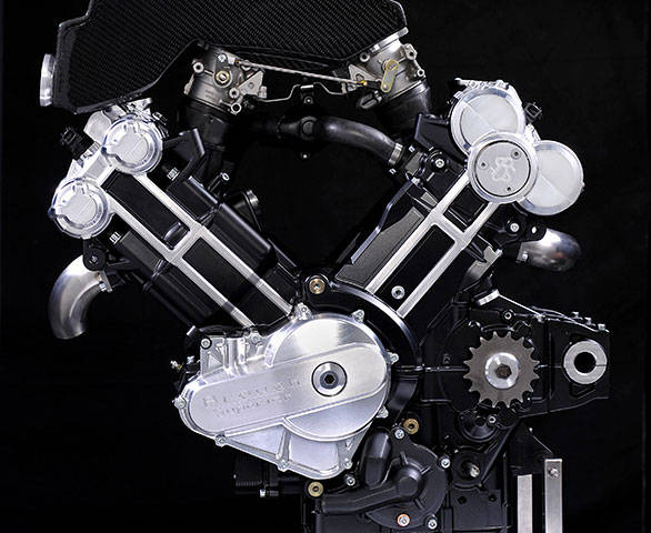 The 997cc engine has cylinders integrated into a horizontal seal plan semi-dry crankcase