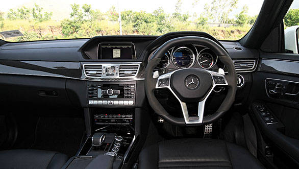 The E63 AMG cabin is sportier and better detailed than the M5's