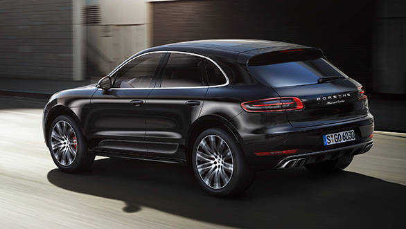 The long black roof spoiler adds to the Macan's flowing design
