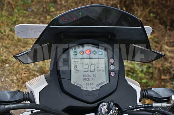 The digital meters have everything. This one wears a Rs 2,500 accessory tall visor
