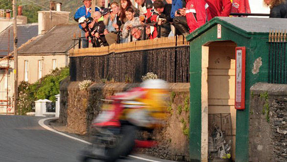 The blur you see there is Guy Martin, and one false move means he will be in the hay bales and crowd. Typical IOMTT, then!