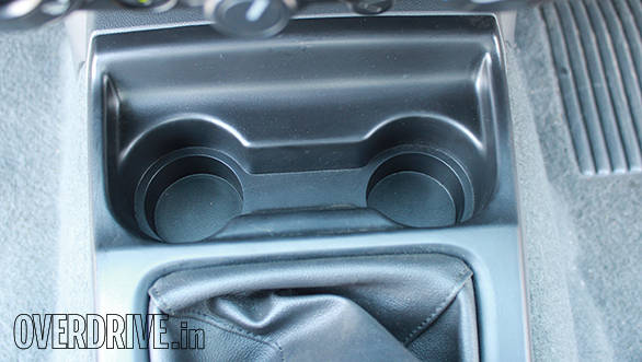 Front cup-holders are placed below the centre console