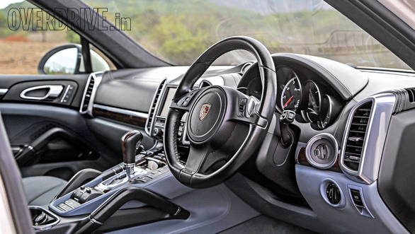 The Porsche has a more luxurious and sporting interior  but with a rather busy centre console peppered with plenty of buttons