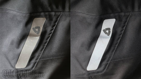 The Rev'it pants use a large reflective stripe on the side and other pants use different configurations. In the pic, the darker image is in normal daylight and the brighter one is shot with flash to show the reflective lighting up. Note the placement of the reflective when buying - it should be in a place where it's visible
