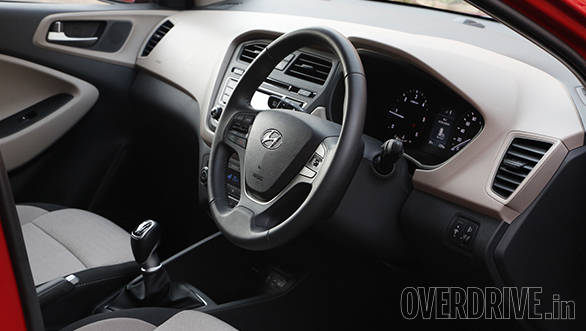 The i20 has a wrap-around dashboard with some of the elements inclined towards the driver