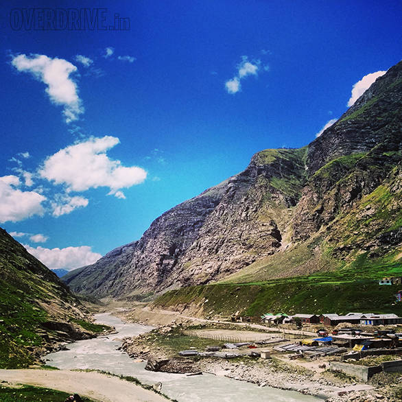 The road runs along the river for a long time after you climb down from Rohtang. This valley is emerald green and is one of the most amazingly visual stretches of the climb to Leh. Soon, all the green will be gone and you'll be well above the vegetation line