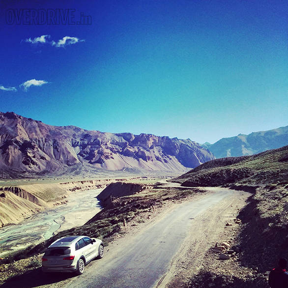 Approaching the Sarchu plain, the river carves quite the vista of sand scultures and the road runs along it. You're torn between zipping through the lovely valley and stopping to capture the scene