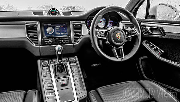 Interior defines luxury while fit and finish is top notch. New design three-spoke steering is great to grip. 7-inch touchscreen displays a lot of info. Note analogue stopwatch part of the sport chrono package