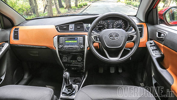 The interiors looks smart while the orange shade adds a good helping of sportiness