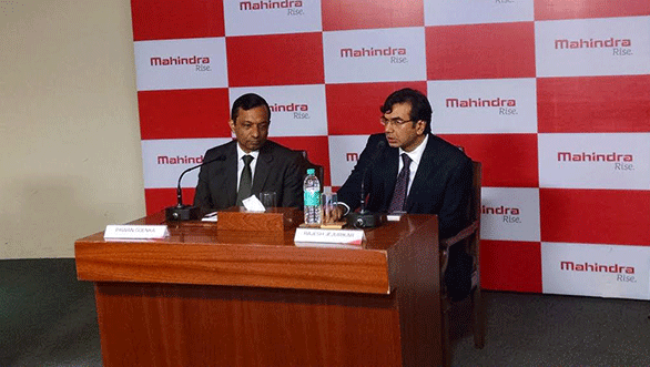 President, Mahindra Automotive and Farm Equipment Sectors, Pawan Goenka and chief executive,  Farm Equipment and Two Wheeler Division, Rajesh Jejurikar at the press conference announcing the merger