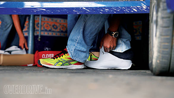 The racing shoe replaces the sneaker before race start