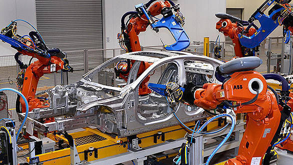 Jaguar-XE-enters-production-robot-assembly