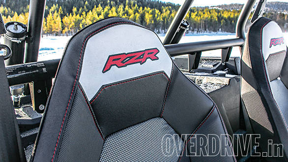 Racecar style bucket seats hold you in place. . .