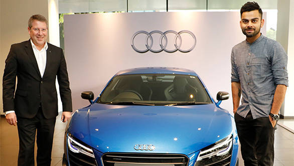 Joe King, Head Audi India delivers the limited edition Audi R8 LMX to Ace Cricketer virat Kohli 1