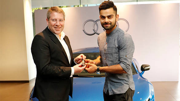 Joe King, Head Audi India delivers the limited edition Audi R8 LMX to Ace Cricketer virat Kohli 2