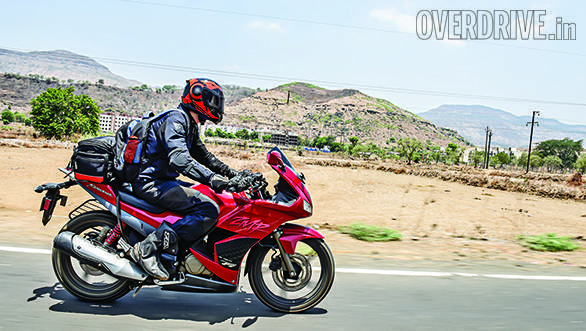 The Hero is a long motorcycle - look how Rishaad's backpack fits neatly ahead of the tail bag