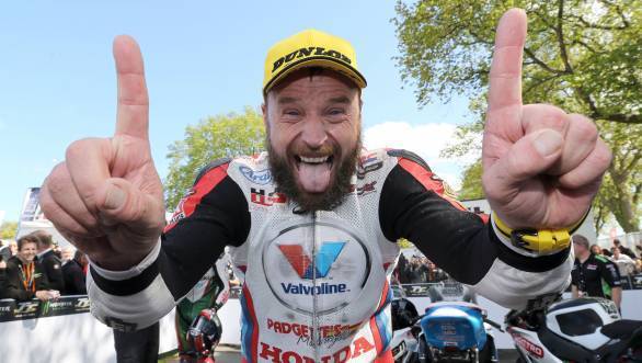 All smiles is Anstey, having prevented Ian Hutchinson from taking his tenth Superbike TT win
