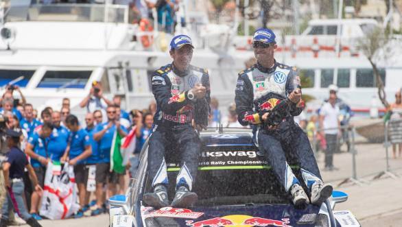 Julien Ingrassia and Ogier celebrate their win at the Rally of Sardinia - they seem to be getting used to this!