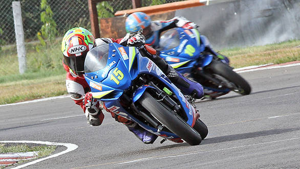 Ananthraj (No.15) in the lead at the last corner while winning the Suzuki Gixxer Cup (Open) race in Chennai on Saturday.