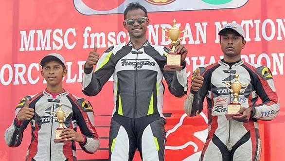 Rajini Krishnan of Moto-Rev Yamaha Racing (centre), winner of the Group B (165cc) Open race flanked by second placed Harry Sylvester (right) and KY Ahamed (both of TVS Racing) in the MMSC FMSCI Indian National Motorcycle Racing Championship in Chennai on Sunday.