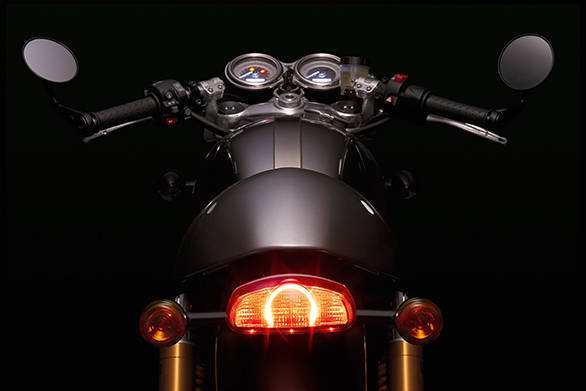 Like the current Thruxton, the 2016 Triumph motorcycle will also get a seat cowl covering the pillion seat. Note new tail lamp shape