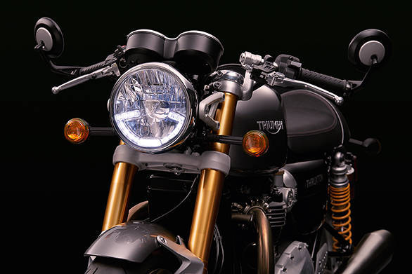 Note the distinctive but simple shape of the LED DRLs that garnish the new clear-lens head lamp. The chrome Triumph shield on top of the head lamp bulb is a small but evocative detail on the 2016 Triumph Thruxton