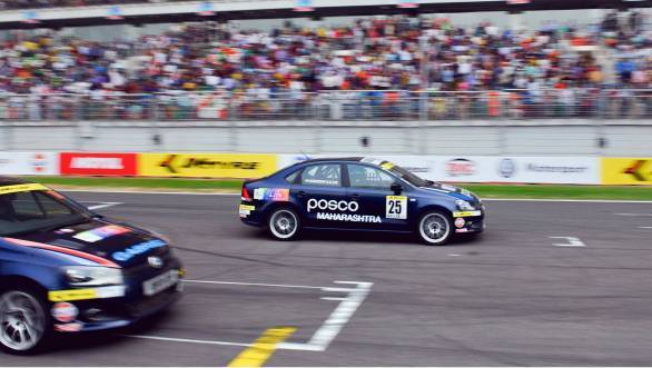 Anindith Reddy crosses the finish line just ahead of the rest of the pack in Race 3 of the Round 3 of the Vento Cup at the BIC