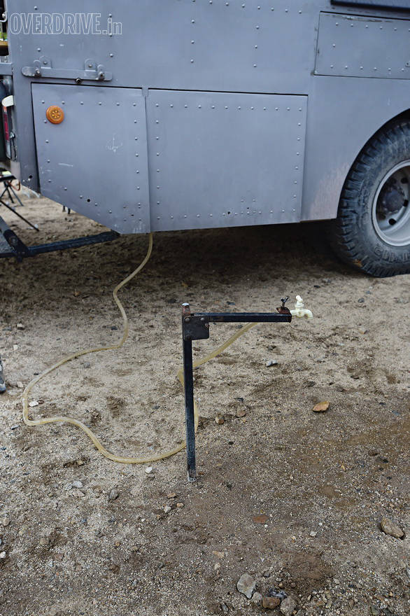 Captain has several innovations on board, from expensive water pumps to this simple metal contraption that turns a water pipe into an easy to use tap