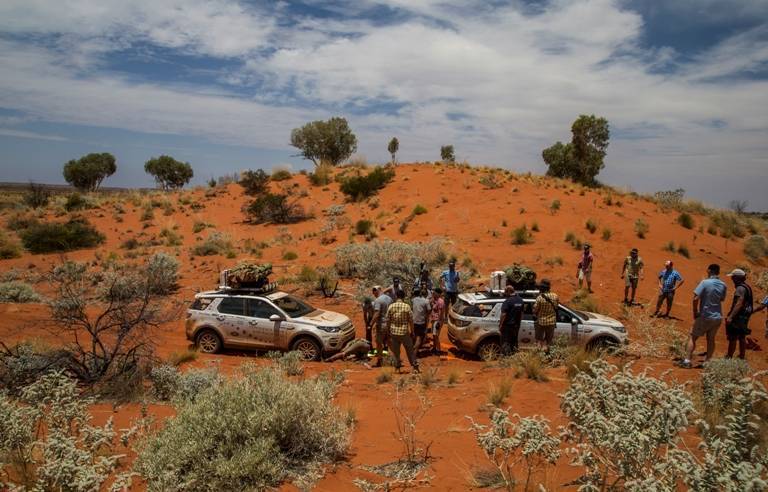 Cars often got bogged down on the sand dunes- and then it was team work