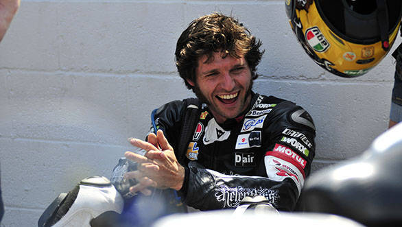 PACEMAKER BELFAST 04/06/11: TAS Relentless rider Guy Martin laughs with his crew before the opening Superbike race of the 2011 Isle of Man TT