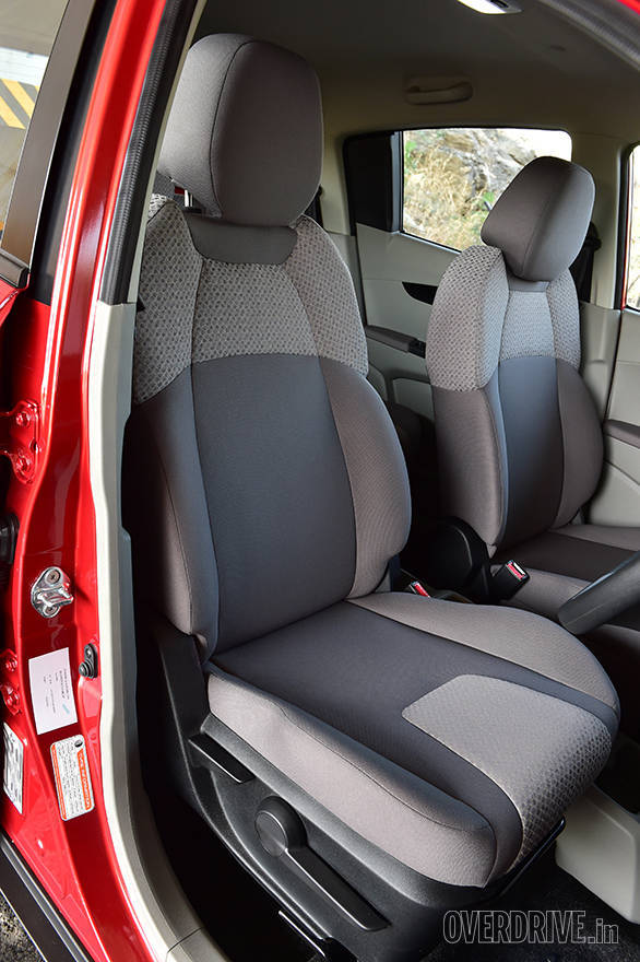 The 5-seater KUV 100 gets separate front seats with removable headrests