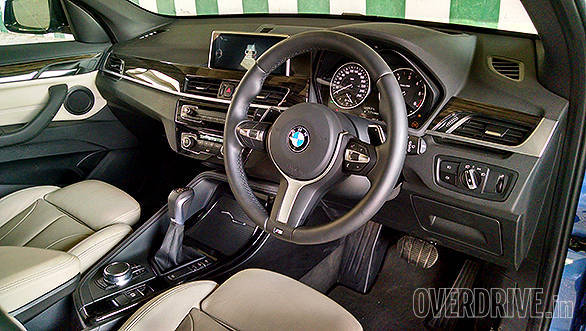 Typical BMW dashboard is simple but good looking and angled towards the driver. Note the M steering wheel