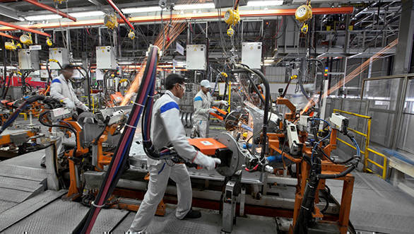 Employees at Volkswagen Pune Plant
