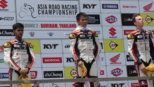 Hari Krishnan stands on the podium after his second-place finish at the Chang International Circuit