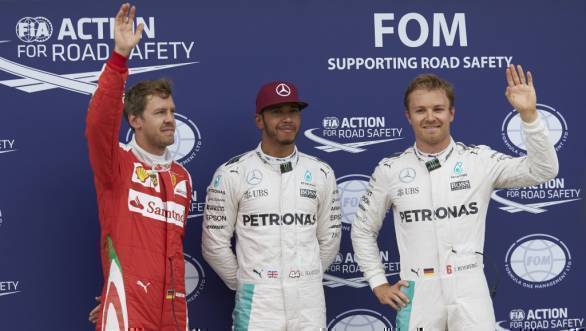 Lewis Hamilton flanked by Ferrari's Sebastian Vettel and Nico Rosberg after qualifying at the 2016 Canadian GP