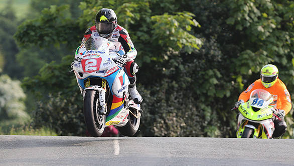 Bruce Anstey (Honda - Valvoline Racing by Padgetts Motorcycles) leads the newcomers on their speed-controlled lap on the opening session of the Monster Energy Isle of Man TT