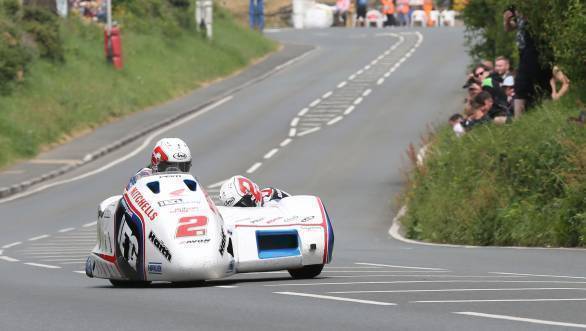 Ben Birchall and Tom Birchall (LCR Honda - IEG Racing) at Bedstead during the Sure Mobile Sidecar TT race