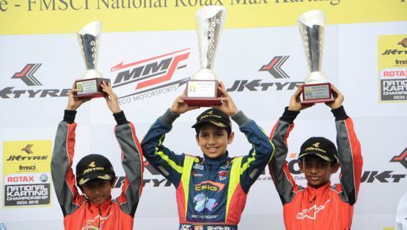Shahan Ali Mohsin, with Ruhaan Alva and Yeasash More on the Micro Max podium