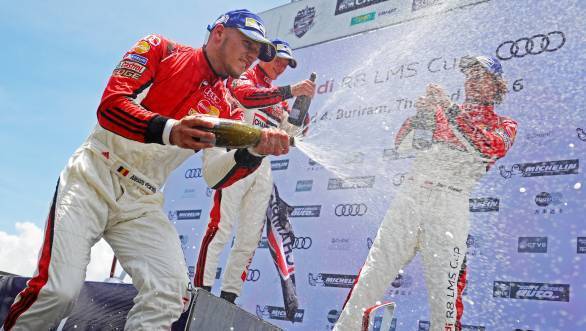 Martin Rump, Alessio Picariello and Jan Kisiel celebrating on the podium of Race 2 of Round 2 of the Audi R8 LMS Cup at the Chang International Circuit