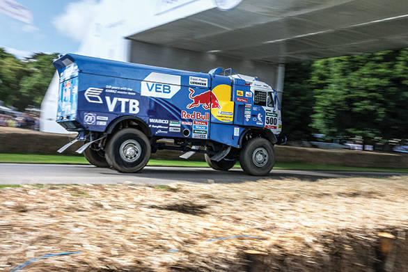 What a sight - Airat Mardeev in the Dakar Kamaz roaring past the hay bales at Goodwood